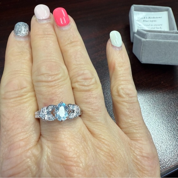 Avon March birthstone Blue Topaz  Ring in Silvertone - Picture 1 of 7